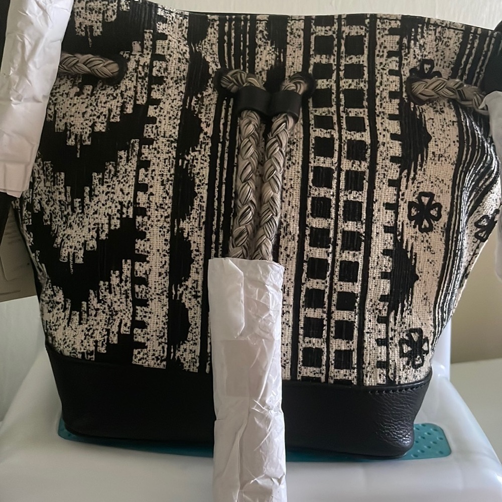 Lucky Bag  material a crossbow or shoulder with a toddle tie.bags is cotton NWT